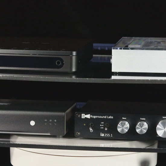 video of a desktop audio rack with 2 acrylic shelves and blue brackets